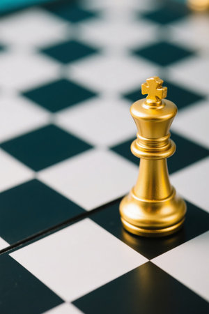Golden chess pieces on the boardの素材