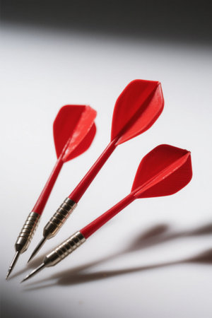 Close-up of three red dartsの素材