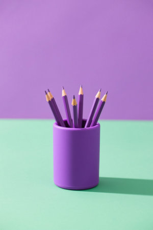 Multiple purple pencils inserted into the purple pen holderの素材