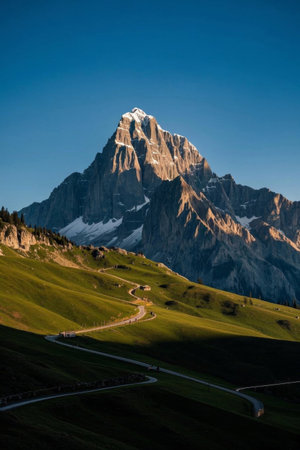 The majestic snow capped mountains beside the mountain roadの素材