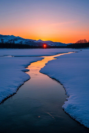 Sunset view of the river in the snowの素材