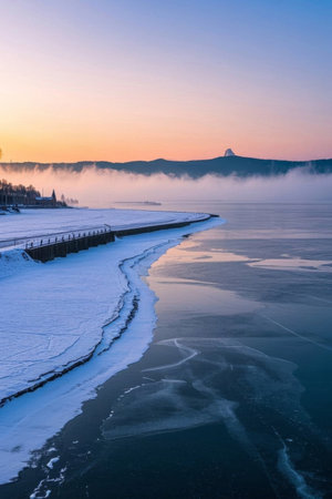 Sunrise view of the ice covered lakesideの素材