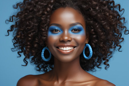 Close up of African American women with blue makeupの素材