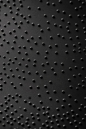 Black with polka dot textured backgroundの素材