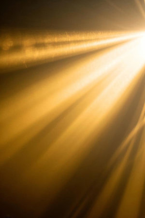 Golden light radiation effect backgroundの素材