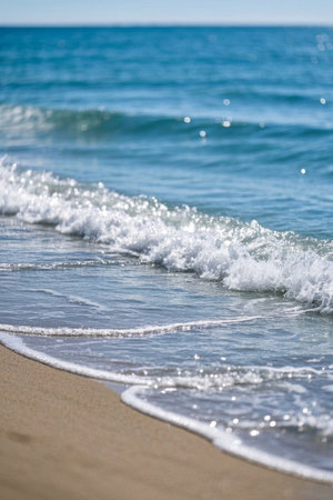 The natural scene of waves crashing on the beachの素材
