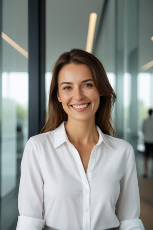 Portrait of Smiling Business Woman Office Environmentの素材