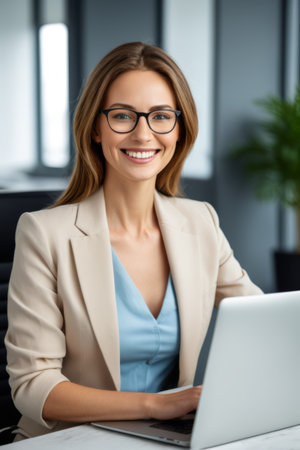 Office women smile using laptopsの素材