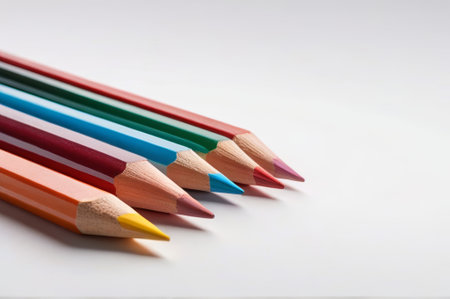 Colored pencils neatly arranged close upsの素材