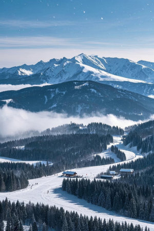 Winter scenery among the snow capped mountains and forestsの素材