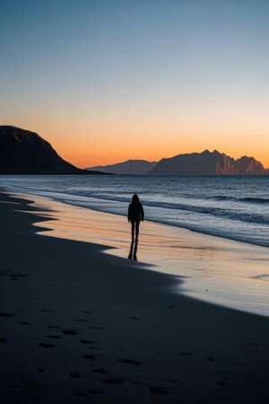 Stroll along the beach for one person and watch the sunsetの素材