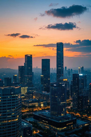 Panoramic sunset view of the city's high rise buildingsの素材