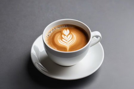 Lava coffee in a white cup and saucerの素材