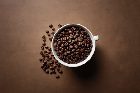 Aerial view of coffee beans in white cupsの素材