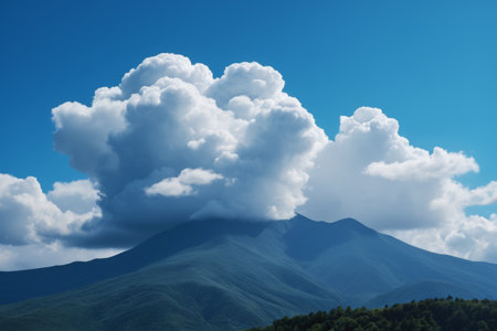 Mountain landscape under blue sky and white cloudsの素材