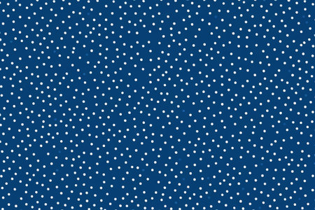 White polka dot pattern on blue backgroundの素材