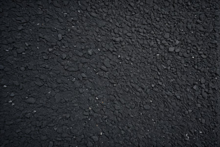 Close up of black asphalt pavement textureの素材