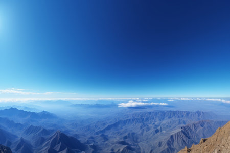 Landscape of rolling mountains under a blue skyの素材