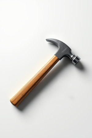Close up of a metal hammer tool with a wooden handleの素材