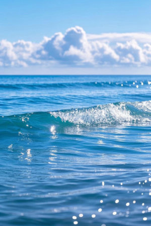Blue ocean waves and white clouds landscapeの素材