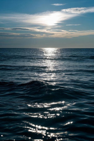 The sun shines on the sea and the natural sceneryの素材