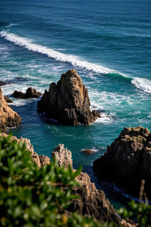 The scene of waves crashing on rocks on the coastの素材