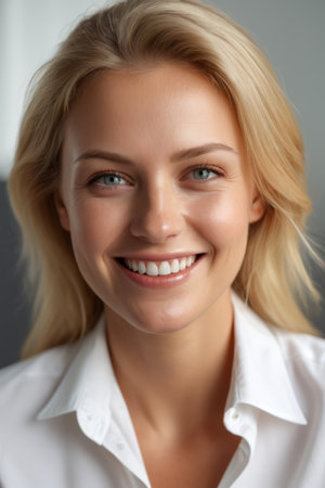 Interior portrait of smiling blonde womanの素材