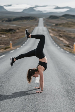 Women's Handstand Fitness on Outdoor Highwayの素材