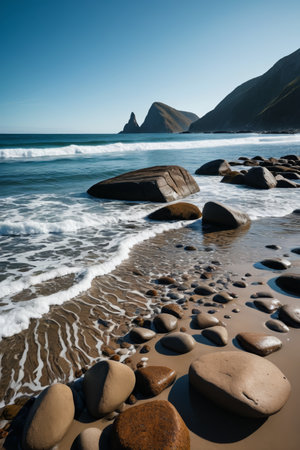 The scene of waves crashing on the reef by the beachの素材