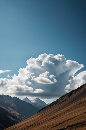 Natural scenery of mountains under blue sky and white cloudsの素材