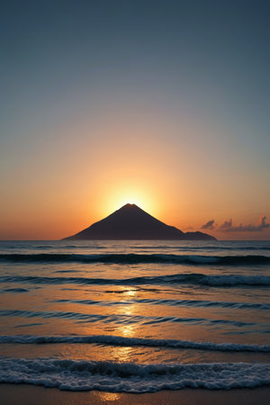 Distant mountain scenery at sunrise on the beachの素材