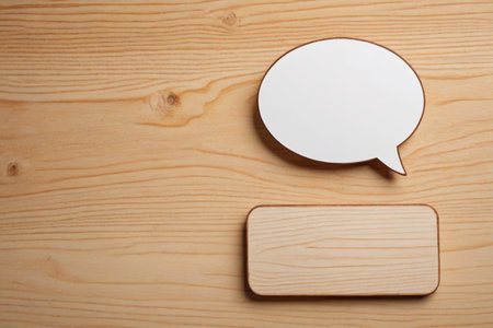 Blank dialog with rectangle on wooden backgroundの素材