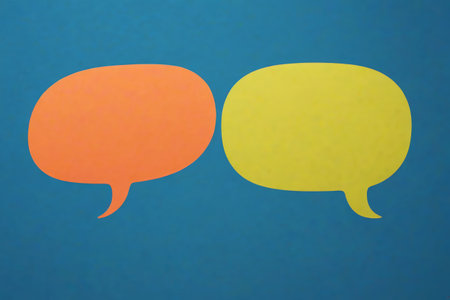 Two color dialogue bubbles on a blue backgroundの素材