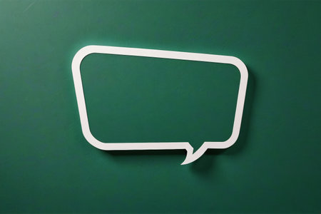 White dialog bubble icon on green backgroundの素材