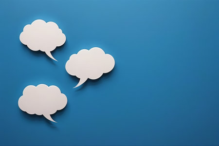 White dialog bubbles on blue backgroundの素材