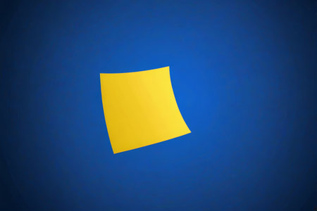 Yellow sticky note on blue backgroundの素材