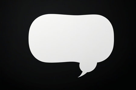 White dialogue bubbles on black backgroundの素材
