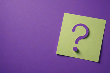 Question mark pattern of yellow sticky notes on a purple backgroundの素材
