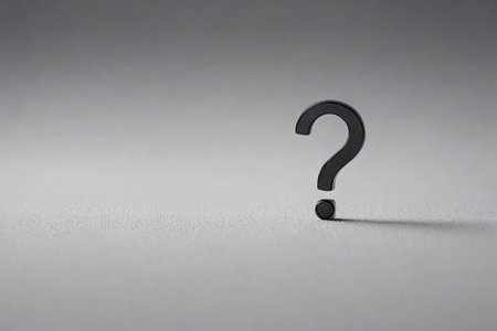 Black question mark on gray backgroundの素材
