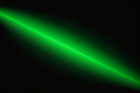 Green laser beam on black backgroundの素材