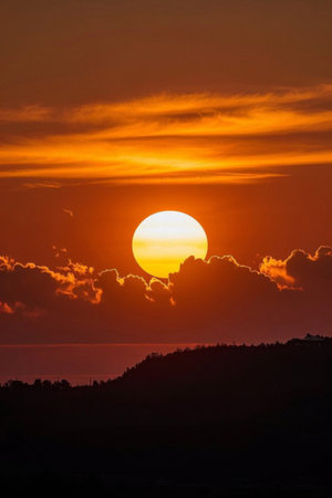 Sun and clouds at sunsetの素材