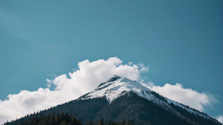 Snowy mountains, blue sky and white clouds, natural sceneryの素材