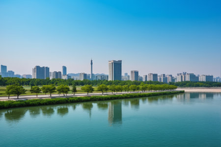 Urban riverside skyscrapers and green tree landscapesの素材