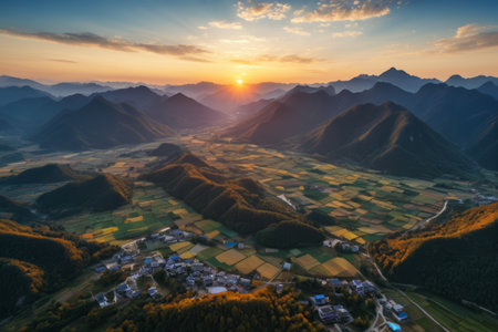 Aerial panoramic view of sunset over rural fieldsの素材