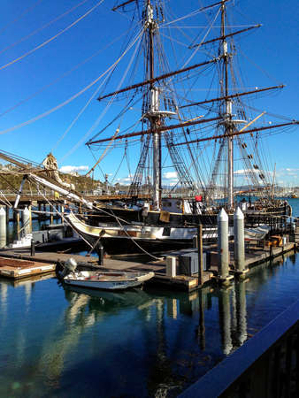 Dana Point, CA / USA - Feb 1, 2016: Replica of the sailing brig, The Pilgrim with reflections of the...