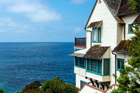 Laguna Beach, CA / USA - 09/02/2020: Exterior of 1929 English Tudor-style home with spectacular ocean views in Wood's Cove, once belonged to Bette Davis and is registered as a historic structure.のeditorial素材