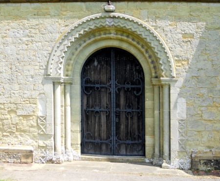 Church doorway Surrey 2, the doorway of a small church in Surrey  UK  with a rounded archの写真素材