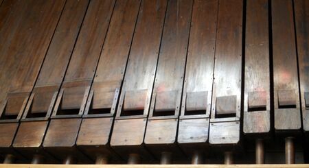 church organ pipes, large wooden organ pipes in a church