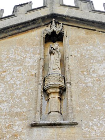 fairford church decoration, stone decoration on the outside of St  Marys 15th Century church, Fairford, Gloucestershire, UKの写真素材