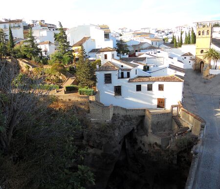 Ronda houses, white houses on a cliff top in Ronda  Spain の写真素材